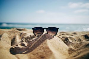 Sunglasses on beach, get ready for summer with HVAC Idaho falls